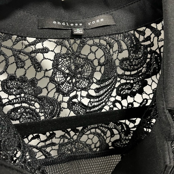 Endless Rose zip jacket. Small. Black. Floral top. White shown as stock photo. - Picture 8 of 9